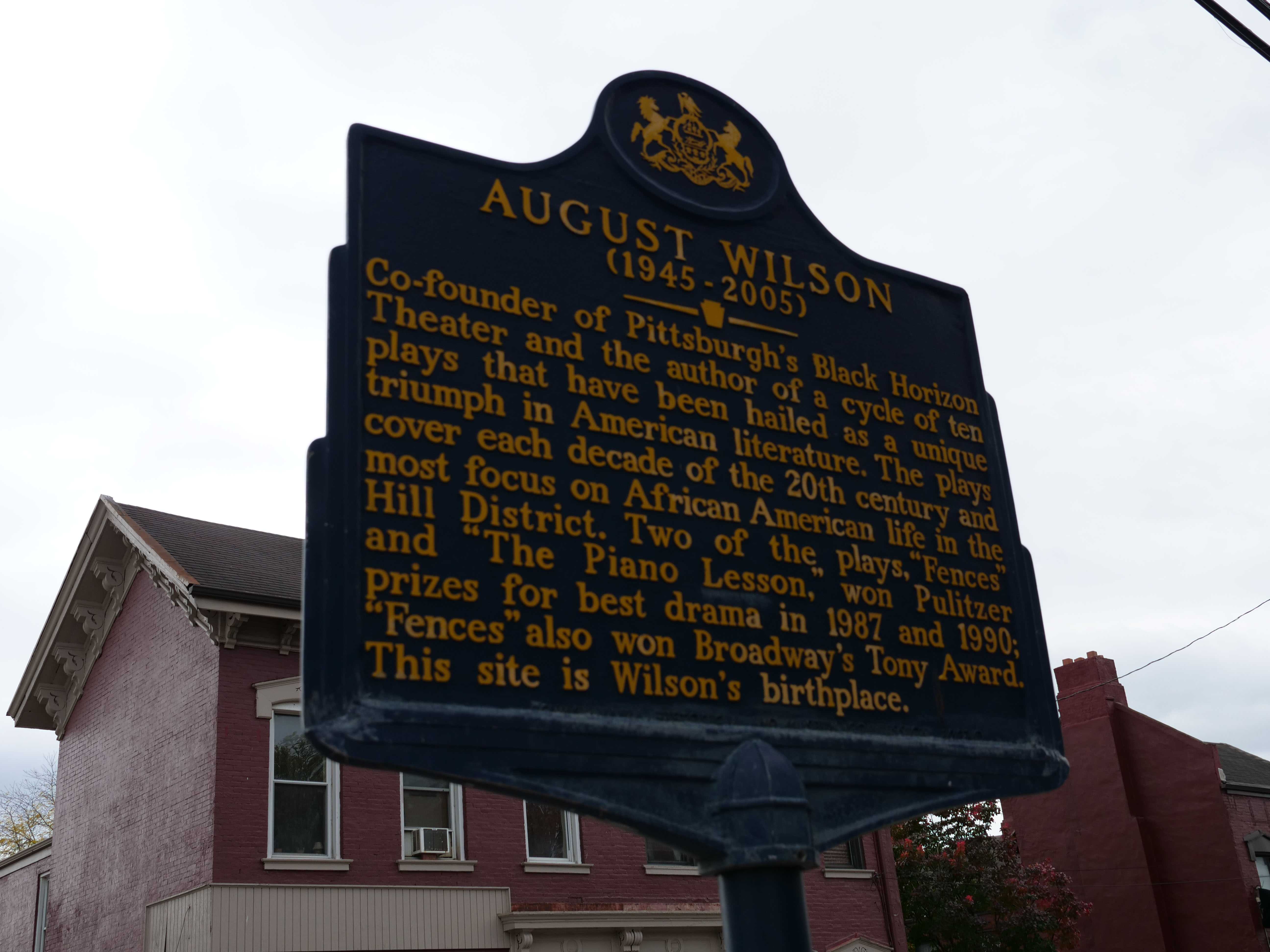 Historic Landmark plaque for the August Wilson House. Photo by Lauren Myers, 2023.