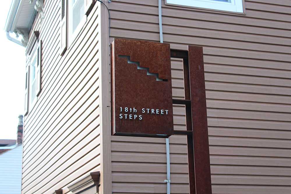 Sign for the 18th Street Stairs. Photo by Jackie Bender, 2021