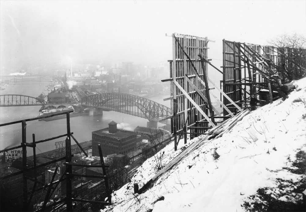 View of the Point from Mt. Washington in 1928. Smog in the air conceals the buildings Downtown. Credit: The Point, March 1, 1928, Pittsburgh City Photographer Collection, Historic Pittsburgh Site.