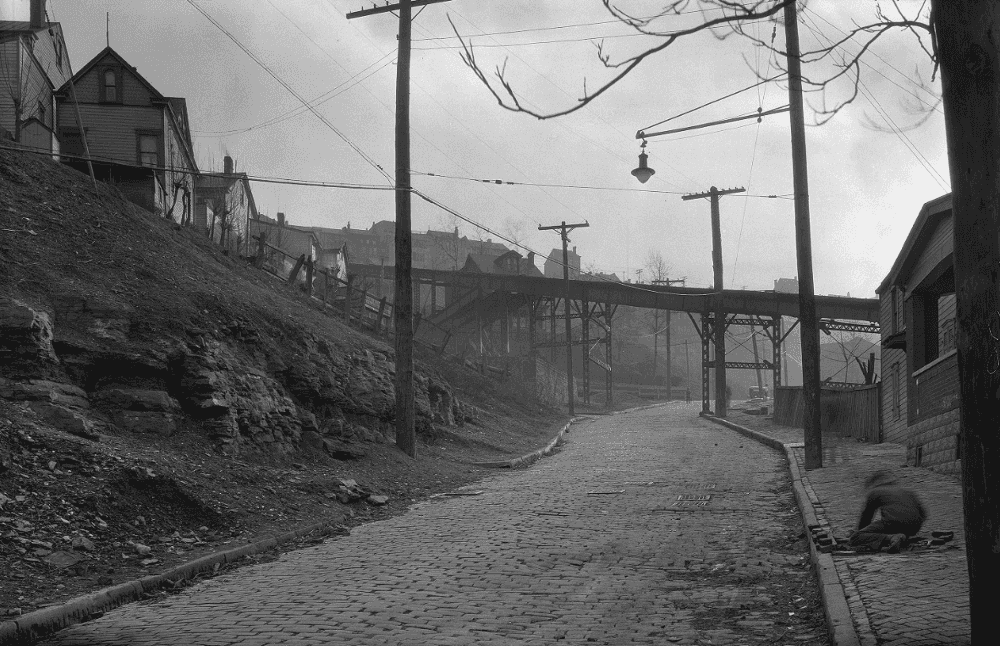 Photo of historic Monastery Street with the Mt. Oliver incline crossing over it by a Pittsburgh City Photographer, 1933