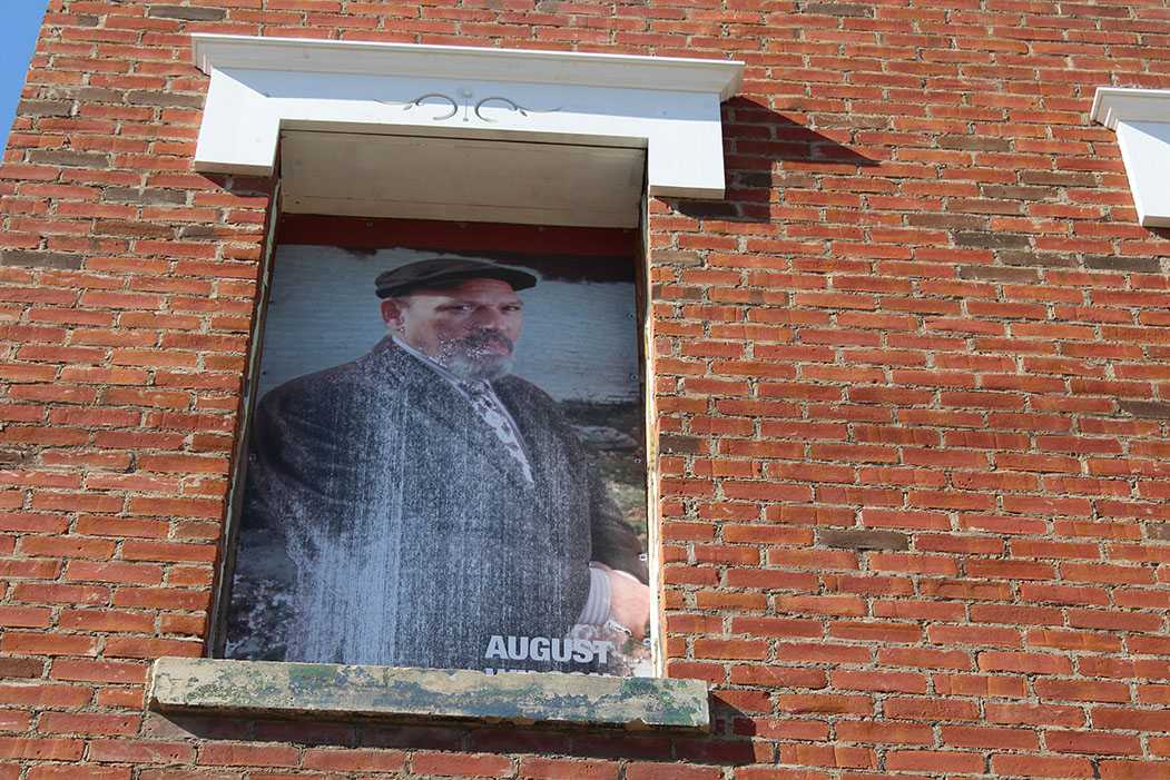 August Wilson sits stoically in the top window in the front of the building. (Taken by Christopher Fisher)