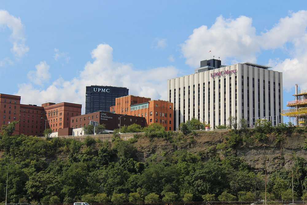 Photo of UPMC Buildings from River Tour Photo by Andrew Kelly, 2021